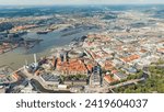 Small photo of Gothenburg, Sweden. River Gota Alv and Rosenlund Canal. Panoramic view of the central part of the city. Summer day. Cloudy weather, Aerial View