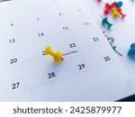 Good Friday march with push pins on calendar