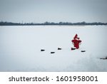 Fire Hydrant In A Snowy Field