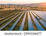 Small photo of Solar farm with photovoltaic panels converting solar power to electricity for green energy