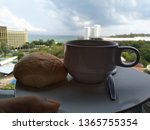 cup of coffee on wooden table.... | Shutterstock . vector #1365755354