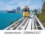 Small photo of Busan, Korea on April 4th, 2023.Colorful Sky Capsule train, a landmark seaside railway route, a destination where tourists take a train by the sea is famous in Busan.