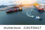 Cargo container ship carrying container and running near Tug boat in international custom shipyard sea port concept smart logistic service. Express boat