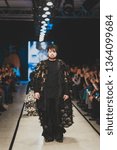 Small photo of Moscow, Russia-March 30, 2019. Actor, parodist Konstantin Kozhevnikov at the demonstration of the collection of designer Nadezhda Shibina in the Mercedes-Benz Fashion Week