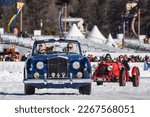 Small photo of St. Moritz, Switzerland - February 25, 2023: A 1958 Bentley Continental leads a 1937 Aston Martin on the frozen surface of Lake St. Moritz at The ICE (International Concours of Elegance) San Moritz.