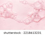 Small photo of Top view pink soap bar wet with bubbles