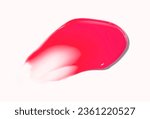 Small photo of Cosmetic balm lip tint smudge fuchsia red cherry color on beige