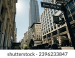 Small photo of Blue West 37th Street historic sign in midtown Manhattan in New York, usa - may 12th 2023. High quality photo