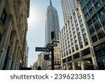 Small photo of Blue West 37th Street historic sign in midtown Manhattan in New York, usa - may 12th 2023. High quality photo
