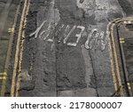 Road markings and varied surface of Pond Street, Sheffield
