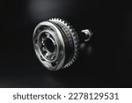 Small photo of Auto CV joint Connecting the drive shaft on a black background. New hinges of equal angular speeds. New car CV joints. Quality spare parts for car service or repair