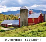 Red Barn And Silo With A...