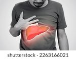 Small photo of Asia men with hepatitis and fatty liver problem. The illustration of liver is on the man's body against gray background.