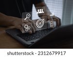 Small photo of Target customer, targeting the business concept, Businessman use laptop with digital marketing icons on virtual screen, Business goal, Digital marketing, online business, Set goals for better results.