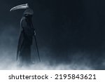 Small photo of Grim reaper on dark background
