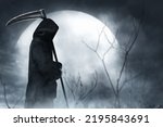 Grim reaper on graveyard night