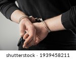 Man Hand Handcuffs In Back 