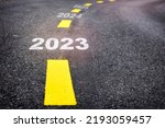 New year 2023 to 2025 on asphalt road with marking lines. Business startup challenge concept and keep moving idea