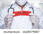 Concept of coronavirus quarantine. MERS-Cov.Novel coronavirus (2019-nCoV).Doctor with a stethoscope Tear the red paper with the word coronavirus.      