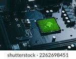 Small photo of Concept of green technology. green world icon on circuit board technology innovations. Environment Green Technology Computer Chip.Green Computing and Technology,CSR, and IT ethics