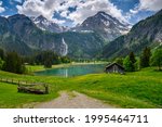 idyllic Lake Lauenensee with Wildhorn in spring, Bernese Alps, Switzerland