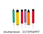 Set of colorful disposable electronic cigarettes of different shapes on a white background. The concept of modern smoking.