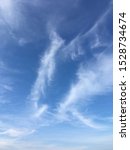 Small photo of Blue sky and aflutter cloud