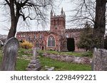 Small photo of The twelfth century Crediton parish church in Devon, UK, formerly known as the Church of the Holy Cross and the Mother of Him who Hung Thereon UK, April 21 2023