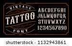 vintage tattoo font. font for... | Shutterstock .eps vector #1132943861
