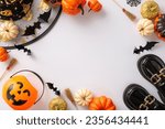 Small photo of Unbelievable Halloween witch suit for young girl. Top view shot of boots, hat, jack-o-lantern basket, spooky decor, pumpkins, broomsticks, ghostly bats on white background for text or advertisement