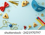 Small photo of Purim merriment arrangement: Top view snapshot of triangle cookies, Star of David figures, masquerade elements, beads, confetti, party horns on pastel blue foundation, text or advert space available