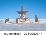 Small photo of An Arctic cultural landmark known as an Inukshuk, used as navigational aids and communication by First Nations people in the Canadian north. Churchill, Manitoba.