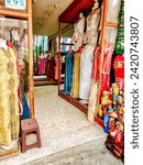 Small photo of Tangier, Morocco - December 29, 2023: Goods for sale in the busy souks in Tangier, Morocco