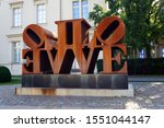 Small photo of BERLIN, GERMANY - AUGUST 22, 2019: Corten steel sculpture "Imperial LOVE" by Robert Indiana, one of the foremost exponents of US Pop Art.