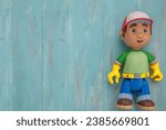 Small photo of SANTA URSULA, SPAIN - OCTOBER 16, 2023: Toy doll of Handy Manny is an American animated television series, created by Roger Bollen, Marilyn Sadler and Rick Gitelson. Toy doll for children