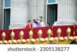 Small photo of London, England, UK. 6th May, 2023. King CHARLES III and Queen Consort Camilla are seen on the balcony of Buckingham Palace following the coronation. King Charles, Queen Camilla wearing crown jewels