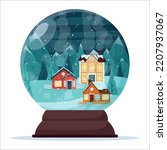 a snow globe with rustic houses ...