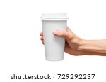 Paper cup in hand.