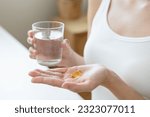 Small photo of Cultivating Wellness: A Person Embraces the Benefits of Fish Oil Supplements for Optimal Health and Vitality