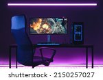 General view of home workplace of pro gamer with professional gaming setup on desktop. Modern powerful PC full RGB light inside, display with shooter game, armchair. Gaming studio of cyber sportsman