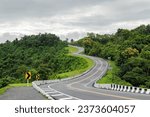 Small photo of Beautiful Road countryside, look like number 3, Is a famous or popular place tourist come to take pictures as souvenirs Nan province, Thailand.