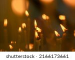 Small photo of Bucharest, Romania - October 25, 2019: Candles lit by the Orthodox believers at the Feast of Saint Demetrios the New, Protector of Bucharest, at the Patriarchal Cathedral, in Bucharest.