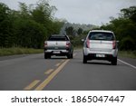 Small photo of itaparica, bahia, brazil - november 4, 2014: vehicle overtakes on the BA 001 highway in the city of Itaparica.