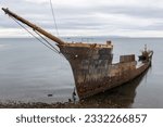 Small photo of Old Rusty Hull of Famous Lord Lonsdale Ship near Punta Arenas Chile. Shipwreck Frigate Remains from Historic Magellan Strait Passage to Tierra Del Fuego or Land of Fires