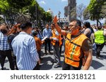 Small photo of Puebla, Mexico; April 19, 2023: Puebla City Hall workers participate in the 2023 national seismic simulacrum, evacuate municipal buildings and gather in the city's zocalo.