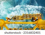 Small photo of Offshore construction platform for production oil and gas. Oil and gas industry and hard work. Production platform and operation process by manual and auto function from control room.