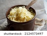 Fermented Cabbage In A Brown...