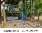 Small photo of A cubby house for children high above a sand pit and gym
