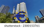 Small photo of Euro sign in front of European Central Bank headquarters skyscraper situated in Frankfurt am Main financial business district,Germany, June 2021