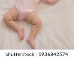 Adorable cute toddler or baby sleeping on bed at night sweet dream in bedroom Lovely child get deep sleep and get relax and comfortable during lay down on bed Little toddler girl legs selective focus